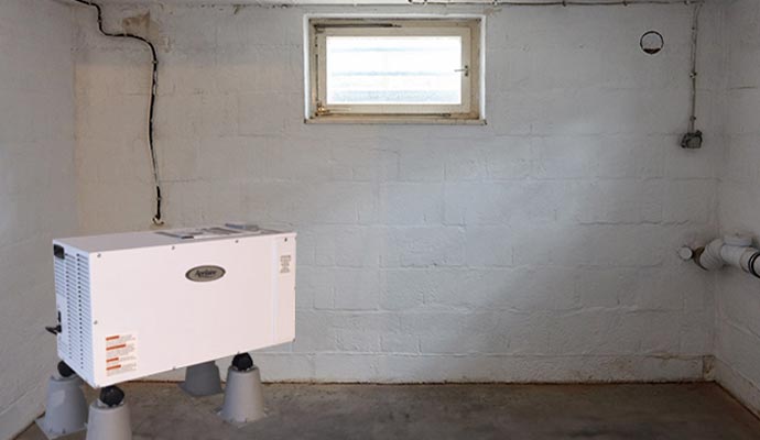 A basement with a dehumidifier