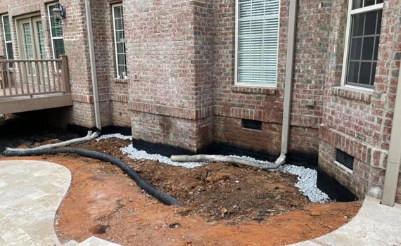 drain tile outside a house
