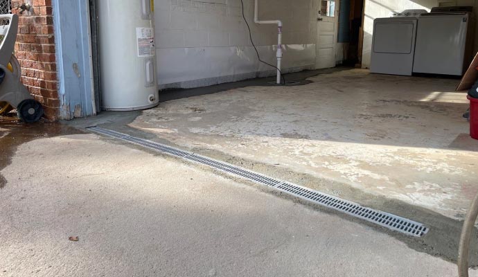 A drainage channel in the concrete floor