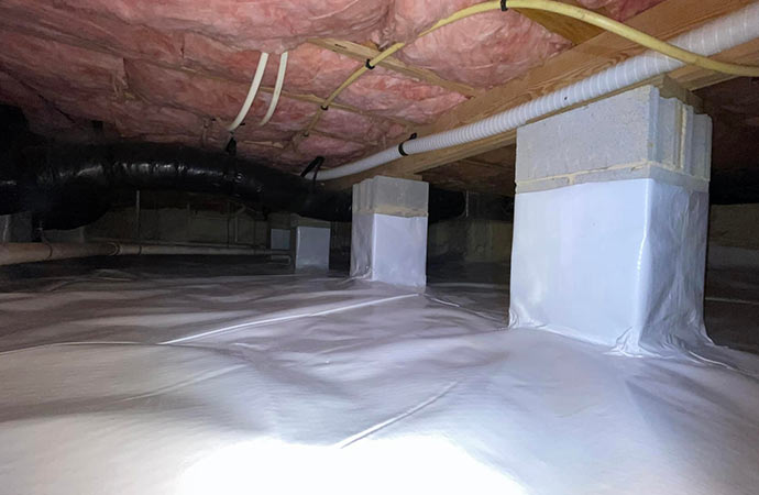 Crawl space repair and encapsulation for enhanced protection and stability.