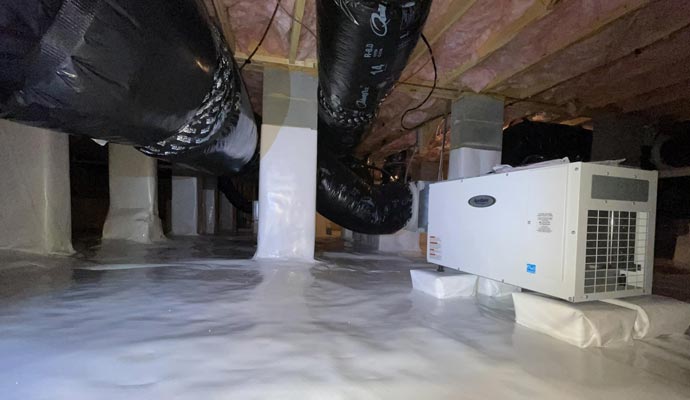 Crawl space with dehumidifier and ductwork