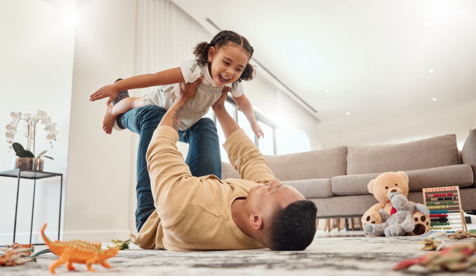 Father playing with his daughter