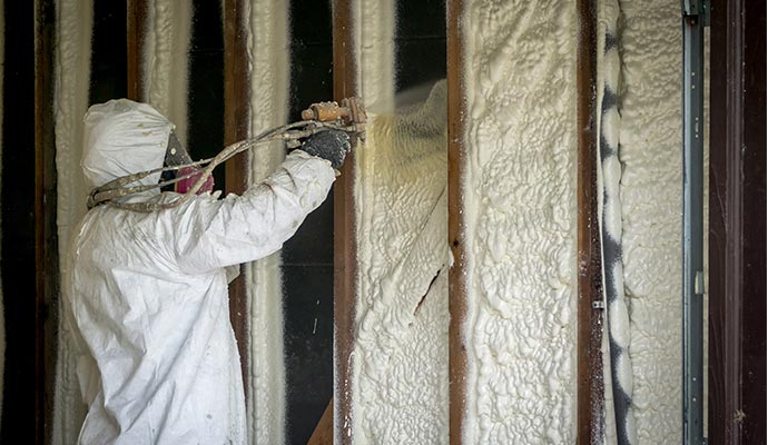 Insulating using spray foam Insulating using spray foam
