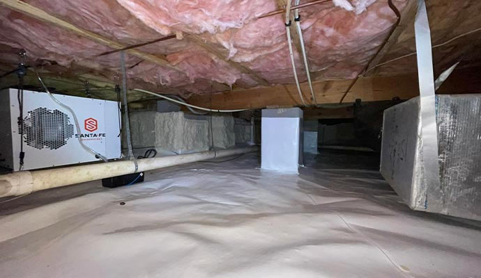 Installed dehumidification system in crawl-space