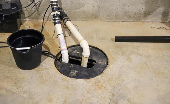 A basement sump pump system with a backup system